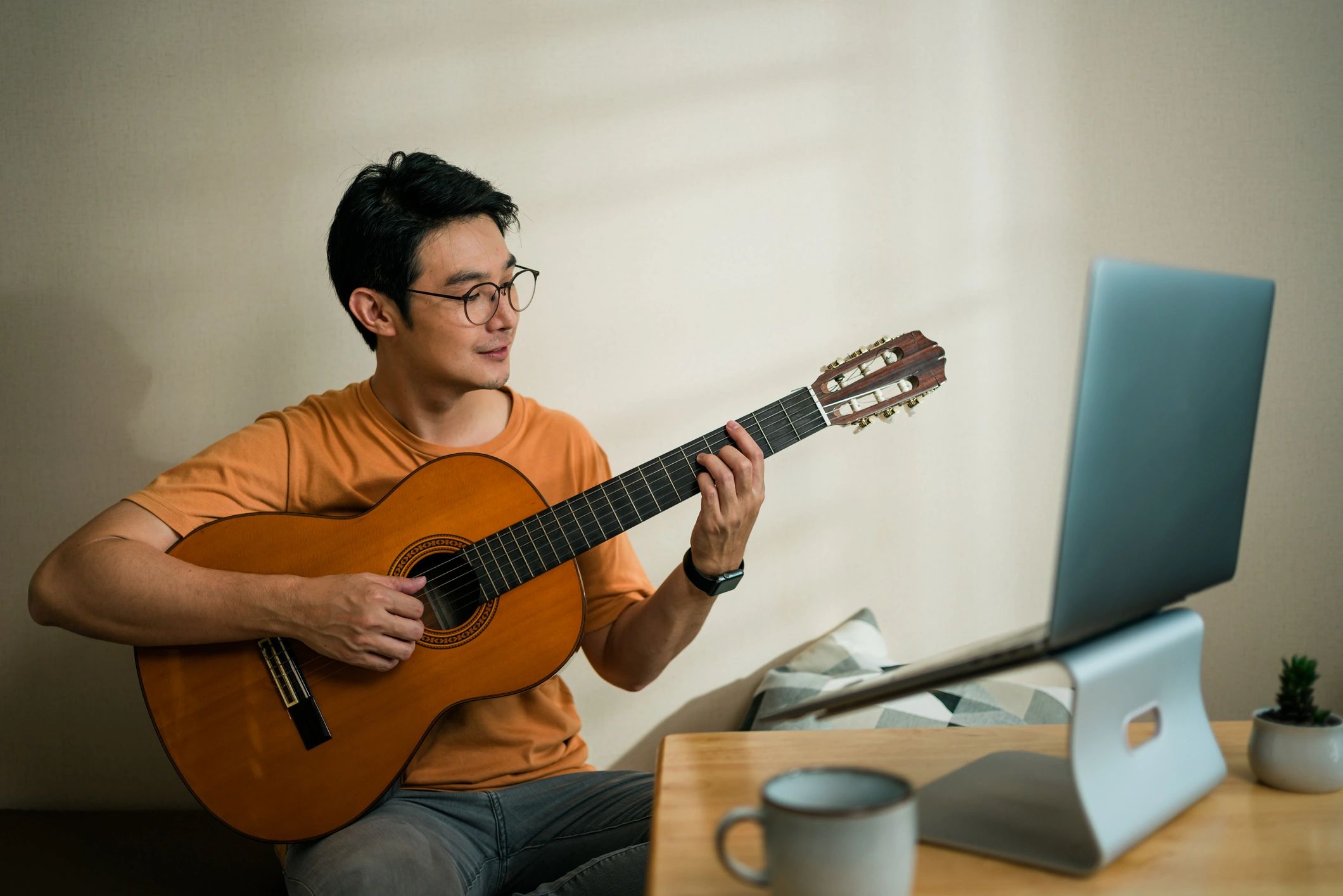 Musician practicing music at home