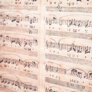Vintage Hand-Written Musical Score on Aged Paper.