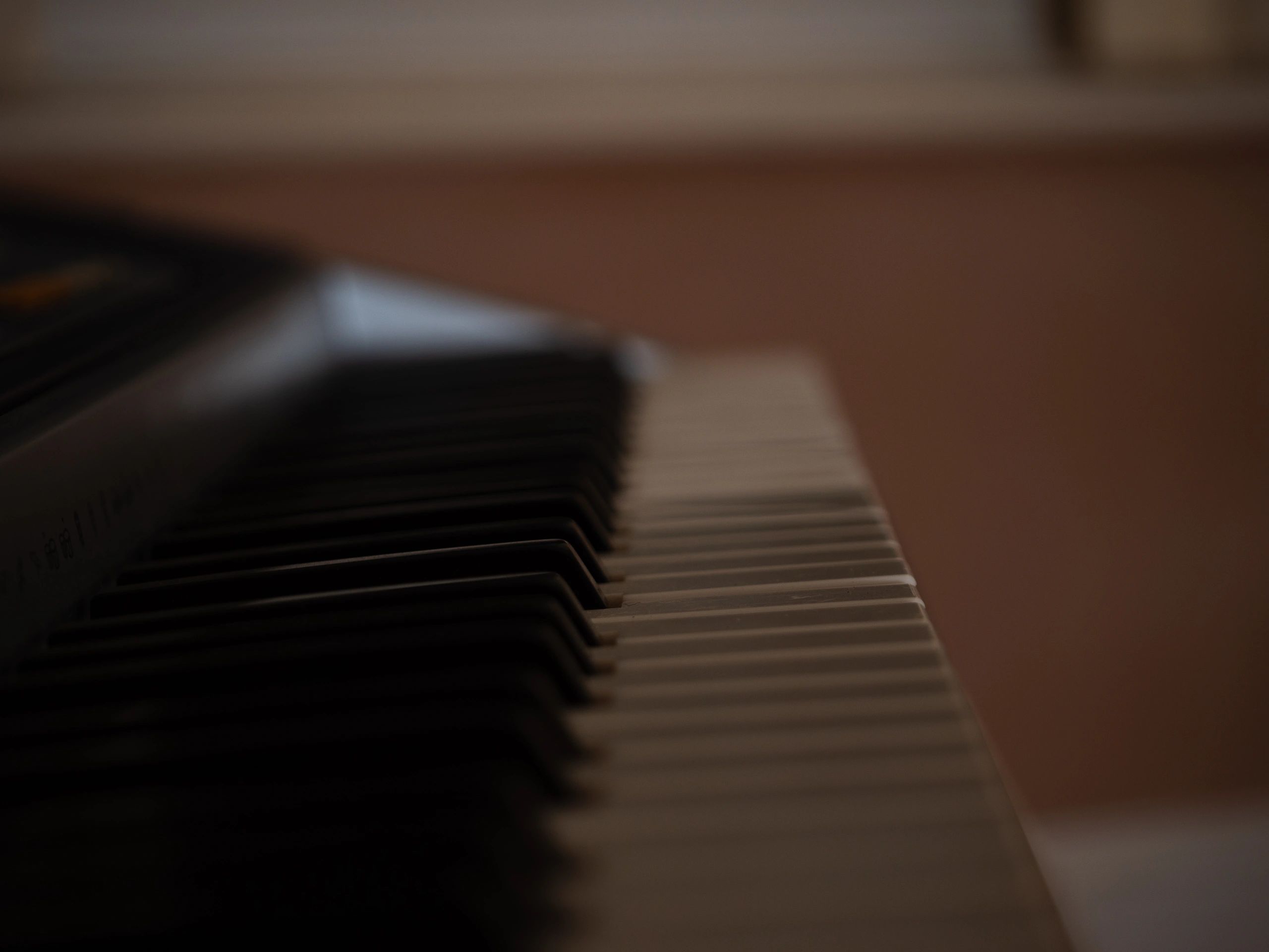 Piano keys and sheet music for transposition service