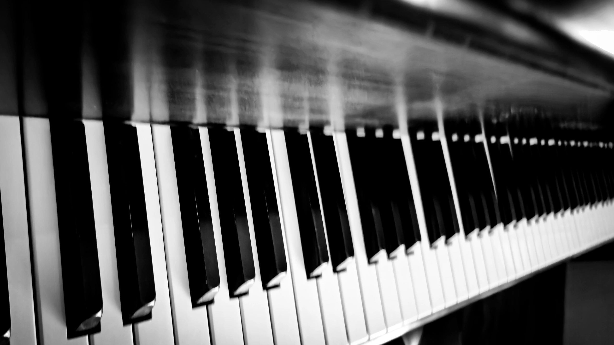 Piano keys and score imagery for strings and piano reduction service